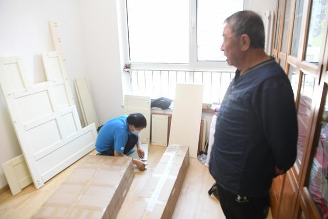 老居民的新篇章 望坛回迁居民凌晨迁新居